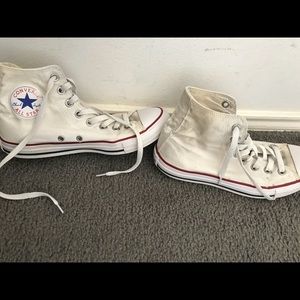 Worn white high top converse